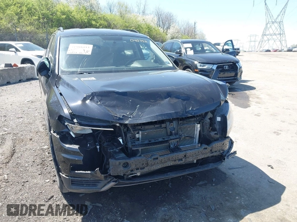 2021 Volkswagen Tiguan S with VIN 3VV0B7AXXMM040752, listed as a IAAI auction lot 41988353 with 51,757 mi miles and . Bid and sale history available at DreamBid. Image 6.