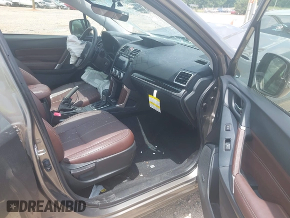 2017 Subaru Forester Touring with VIN JF2SJGWCXHH558789, listed as a IAAI auction lot 42518698 with 112,294 mi miles and . Bid and sale history available at DreamBid. Image 5.