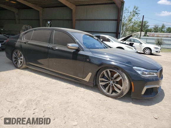 2019 BMW 7 Series M760i xDrive with VIN WBA7H6C50KG615270, listed as a Copart auction lot 59960854 with 42,172 mi miles and Salvage title. Bid and sale history available at DreamBid. Image 4.