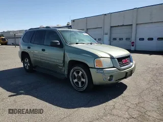 2004 GMC Envoy SLE with VIN 1GKDS13S442417232, listed as a Copart auction lot 51821225 with 242,945 mi miles and Salvage Title. Bid and sale history available at carsss.com. Image 12.
