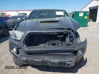 2017 Toyota Tacoma SR5 with VIN 5TFAZ5CN7HX033594, listed as a IAAI auction lot 41881117 with 86,676 mi miles and . Bid and sale history available at DreamBid. Image 12.