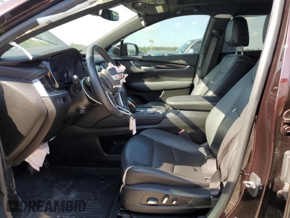 2021 Cadillac XT5 FWD Premium Luxury with VIN 1GYKNCRS2MZ180884, listed as a Copart auction lot 50433445 with 27,246 mi miles and Salvage Title. Bid and sale history available at carsss.com. Image 7.