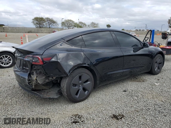 2022 Tesla Model 3 Long Range with VIN 5YJ3E1EB6NF334914, listed as a Copart auction lot 53876415 with 52,875 mi miles and Salvage Title. Bid and sale history available at carsss.com. Image 3.