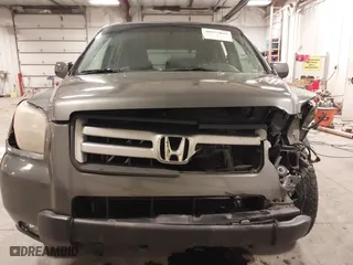 2007 Honda Pilot EX-L with VIN 2HKYF187X7H528523, listed as a IAAI auction lot 40977045 with 139,463 mi miles. Bid and sale history available at carsss.com. Image 13.