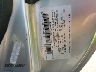 2003 Mazda MX-5 Miata Cloth z VIN JM1NB353X30311086, wystawiony jako Copart lot #57685445 z przebiegiem 141 634 mil mil oraz Szkoda całkowita • Salvage title. Historia ofert i sprzedaży dostępna na DreamBid. Obrazek 12.