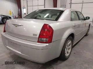 2006 Chrysler 300 Touring with VIN 2C3KA53G36H506880, listed as a IAAI auction lot 42177012 with 135,992 mi miles. Bid and sale history available at carsss.com. Image 4.