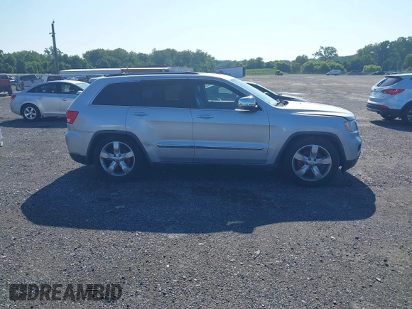 2011 Jeep Grand Cherokee Overland Summit with VIN 1J4RR6GT9BC535985, listed as a IAAI auction lot 42556913 with 108,845 mi miles and . Bid and sale history available at DreamBid. Image 13.