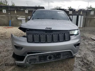 2021 Jeep Grand Cherokee Laredo X with VIN 1C4RJEAG0MC814067, listed as a Copart auction lot 52042035 with 39,127 mi miles and Non repairable. Bid and sale history available at DreamBid. Image 5.