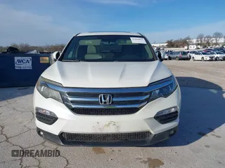 2016 Honda Pilot EX-L with VIN 5FNYF5H5XGB016152, listed as a IAAI auction lot 41820023 with 210,474 mi miles and . Bid and sale history available at DreamBid. Image 13.