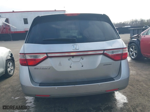 2013 Honda Odyssey Touring with VIN 5FNRL5H97DB021403, listed as a IAAI auction lot 41606606 with 223,547 mi miles. Bid and sale history available at carsss.com. Image 16.
