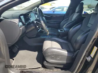 2017 Tesla Model X 90D with VIN 5YJXCBE20HF051099, listed as a Copart auction lot 52208205 with 118,828 mi miles and Salvage Title. Bid and sale history available at DreamBid. Image 7.