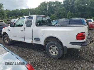 2000 Ford F-150 with VIN 2FTRX08W3YCA36619, listed as a Copart auction lot 62683885 with Not provided miles and Salvage title. Bid and sale history available at DreamBid. Image 2.