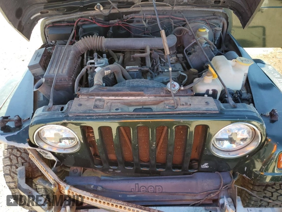1997 Jeep Wrangler Sahara with VIN 1J4FY49S6VP521988, listed as a Copart auction lot 80753494 with 99,909 mi miles and Salvage Title. Bid and sale history available at carsss.com. Image 11.