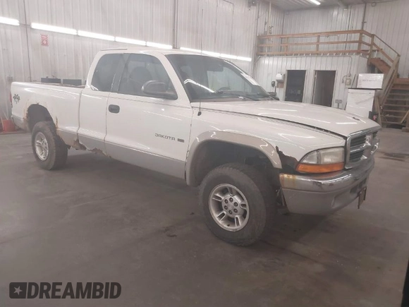 1999 Dodge Dakota SLT with VIN 1B7GG22XXXS254782, listed as a IAAI auction lot 41847644 with 164,607 mi miles and . Bid and sale history available at carsss.com. Image 1.
