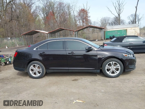 2013 Ford Taurus SEL with VIN 1FAHP2E87DG220389, listed as a IAAI auction lot 41930118 with 128,324 mi miles and . Bid and sale history available at carsss.com. Image 13.