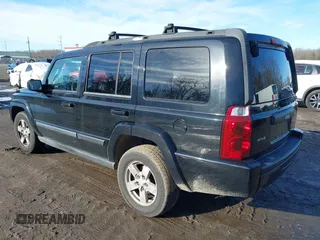 2007 Jeep Commander Sport z VIN 1J8HG48K97C566185, wystawiony jako IAAI lot #41519140 z przebiegiem 127 230 mil mil oraz . Historia ofert i sprzedaży dostępna na DreamBid. Obrazek 3.