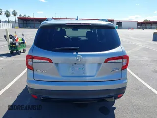 2021 Honda Pilot Special Edition with VIN 5FNYF6H27MB094704, listed as a IAAI auction lot 41953899 with 55,462 mi miles and . Bid and sale history available at DreamBid. Image 17.