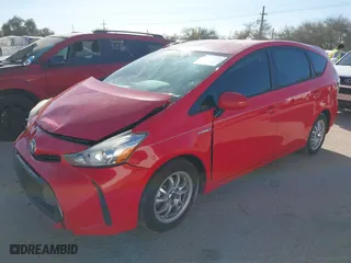 2015 Toyota Prius v Two with VIN JTDZN3EU0FJ037056, listed as a IAAI auction lot 41181363 with 128,873 mi miles. Bid and sale history available at carsss.com. Image 17.