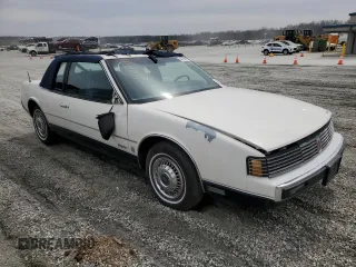 1987 Oldsmobile Toronado with VIN 1G3EZ1130HU307201, listed as a Copart auction lot 49290815 with 104,837 mi miles and Salvage Title. Bid and sale history available at DreamBid. Image 4.