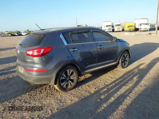 2013 Kia Sportage SX with VIN KNDPCCA60D7447693, listed as a IAAI auction lot 42025038 with Not Provided miles and . Bid and sale history available at carsss.com. Image 4.