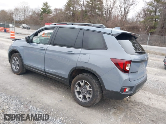 2022 Honda Passport TrailSport with VIN 5FNYF8H61NB018170, listed as a IAAI auction lot 41503190 with 21,469 mi miles and . Bid and sale history available at DreamBid. Image 3.