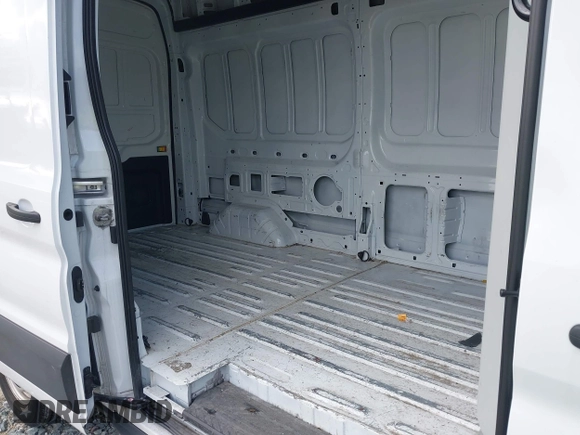 2023 Ford Transit Cargo с VIN 1FTBR1X88PKA71476, выставлен на аукционе IAAI как лот 41835185 с пробегом 39 374 миль миль и . История ставок и продаж доступна на DreamBid. Изображение 8.