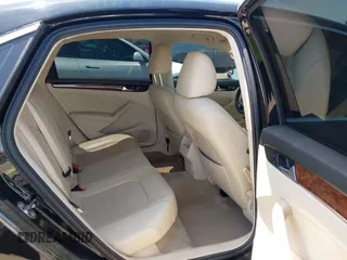 2012 Volkswagen Passat SEL z VIN 1VWCH7A37CC060266, wystawiony jako IAAI lot #42531048 z przebiegiem 93 825 mil mil oraz . Historia ofert i sprzedaży dostępna na DreamBid. Obrazek 8.