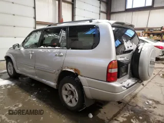 2003 Suzuki XL7 Touring z VIN JS3TX92V534106982, wystawiony jako Copart lot #85931744 z przebiegiem 307 709 mil mil oraz Szkoda całkowita • Salvage title. Historia ofert i sprzedaży dostępna na DreamBid. Obrazek 2.