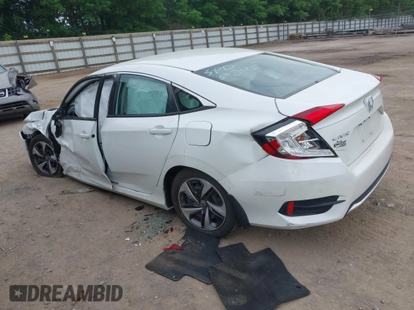 2020 Honda Civic LX z VIN 19XFC2F66LE021813, wystawiony jako IAAI lot #42285033 z przebiegiem 116 069 mil mil oraz . Historia ofert i sprzedaży dostępna na DreamBid. Obrazek 3.