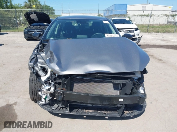 2024 Kia Forte LXS with VIN 3KPF24AD8RE726691, listed as a IAAI auction lot 42026037 with 27,816 mi miles and . Bid and sale history available at DreamBid. Image 13.