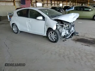 2013 Toyota Prius One z VIN JTDKDTB38D1033589, wystawiony jako Copart lot #55520355 z przebiegiem Nie podano mil oraz Szkoda całkowita • Salvage title. Historia ofert i sprzedaży dostępna na DreamBid. Obrazek 13.