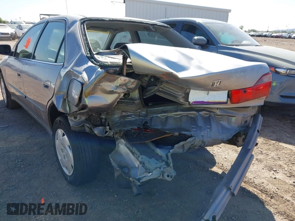 2000 Honda Accord LX z VIN 1HGCG1645YA021815, wystawiony jako IAAI lot #42438876 z przebiegiem 219 687 mil mil oraz . Historia ofert i sprzedaży dostępna na DreamBid. Obrazek 6.