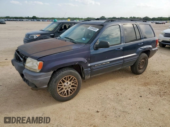 2004 Jeep Grand Cherokee with VIN 1J8GX58J54C121513, listed as a Copart auction lot 59384005 with 221,397 mi miles and Salvage title. Bid and sale history available at DreamBid. Image 1.