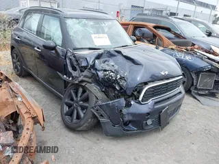 2014 MINI Countryman S z VIN WMWZC3C5XEWP28661, wystawiony jako IAAI lot #42486372 z przebiegiem 141 581 mil mil oraz . Historia ofert i sprzedaży dostępna na DreamBid. Obrazek 1.
