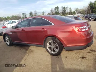2014 Ford Taurus SEL with VIN 1FAHP2E88EG167929, listed as a Copart auction lot 54168175 with 171,082 mi miles and Clean Title. Bid and sale history available at DreamBid. Image 2.