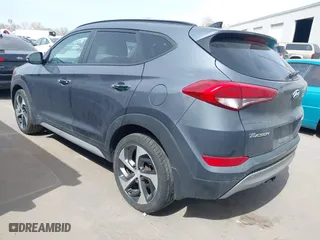 2018 Hyundai Tucson Value with VIN KM8J3CA24JU646807, listed as a IAAI auction lot 41960629 with 117,646 mi miles. Bid and sale history available at carsss.com. Image 3.