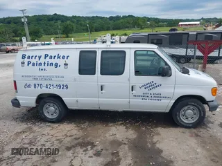 2006 Ford Econoline Cargo with VIN 1FTRE14W56HA74697, listed as a IAAI auction lot 42341374 with 153,519 mi miles and . Bid and sale history available at DreamBid. Image 12.