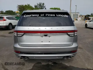 2023 Lincoln Aviator Reserve z VIN 5LM5J7WCXPGL20322, wystawiony jako Copart lot #58003605 z przebiegiem 14 563 mil mil oraz Szkoda całkowita • Salvage title. Historia ofert i sprzedaży dostępna na DreamBid. Obrazek 6.