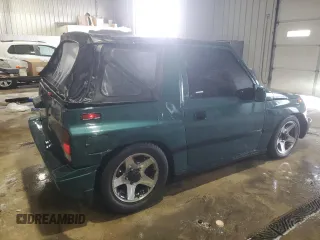 1996 Chevrolet Tracker z VIN 2CNBJ1869T6903842, wystawiony jako Copart lot #87734315 z przebiegiem 120 835 mil mil oraz Szkoda całkowita • Salvage title. Historia ofert i sprzedaży dostępna na DreamBid. Obrazek 3.