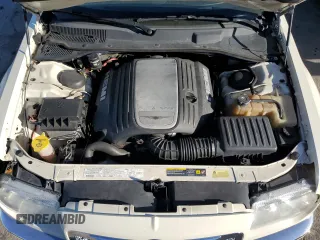 2005 Chrysler 300 C z VIN 2C3JA63H05H504299, wystawiony jako Copart lot #82318874 z przebiegiem 88 039 mil mil oraz Szkoda całkowita • Salvage title. Historia ofert i sprzedaży dostępna na DreamBid. Obrazek 12.