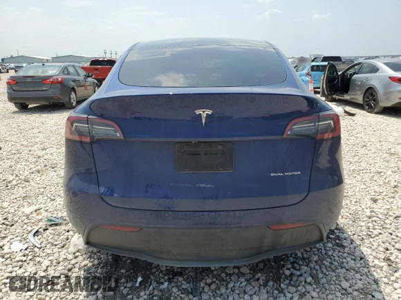 2024 Tesla Model Y Long Range with VIN 7SAYGAEE6RF196245, listed as a Copart auction lot 54667765 with 10,336 mi miles and Salvage title. Bid and sale history available at DreamBid. Image 6.