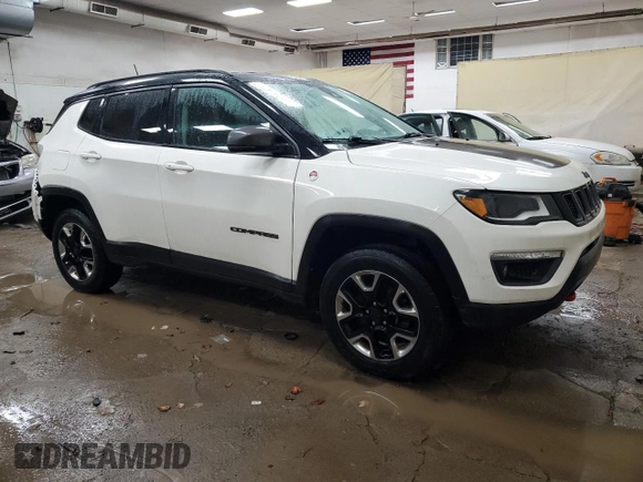 2018 Jeep Compass Trailhawk with VIN 3C4NJDDBXJT255622, listed as a Copart auction lot 85917244 with 73,388 mi miles and Clean Title. Bid and sale history available at carsss.com. Image 4.