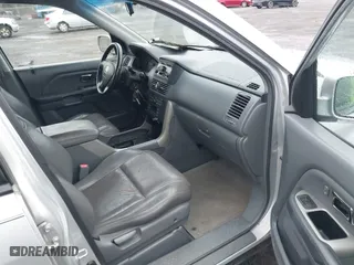 2004 Honda Pilot EX with VIN 2HKYF18534H617991, listed as a IAAI auction lot 41855906 with 193,084 mi miles. Bid and sale history available at carsss.com. Image 5.