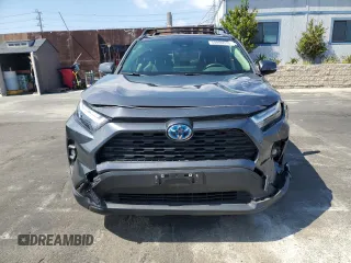 2023 Toyota RAV4 Hybrid XLE Premium z VIN JTMB6RFV5PD080395, wystawiony jako Copart lot #54899515 z przebiegiem 9 190 mil mil oraz Szkoda całkowita • Salvage title. Historia ofert i sprzedaży dostępna na DreamBid. Obrazek 5.