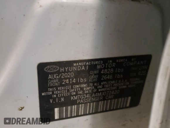 2021 Genesis G70 2.0T z VIN KMTG34LA4MU072420, wystawiony jako Copart lot #87259094 z przebiegiem 36 491 mil mil oraz Szkoda całkowita • Salvage title. Historia ofert i sprzedaży dostępna na DreamBid. Obrazek 12.