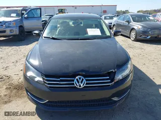2013 Volkswagen Passat SE w/Sunroof with VIN 1VWBH7A36DC020984, listed as a IAAI auction lot 41883902 with 169,916 mi miles. Bid and sale history available at carsss.com. Image 12.