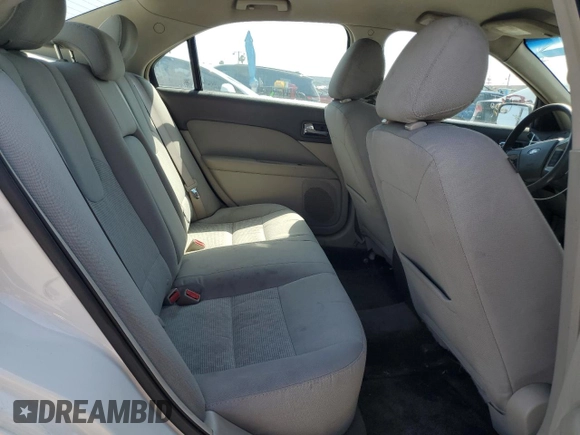 2012 Ford Fusion SE z VIN 3FAHP0HA9CR122037, wystawiony jako Copart lot #58367255 z przebiegiem 136 266 mil mil oraz Czysty tytuł • Clean title. Historia ofert i sprzedaży dostępna na DreamBid. Obrazek 10.