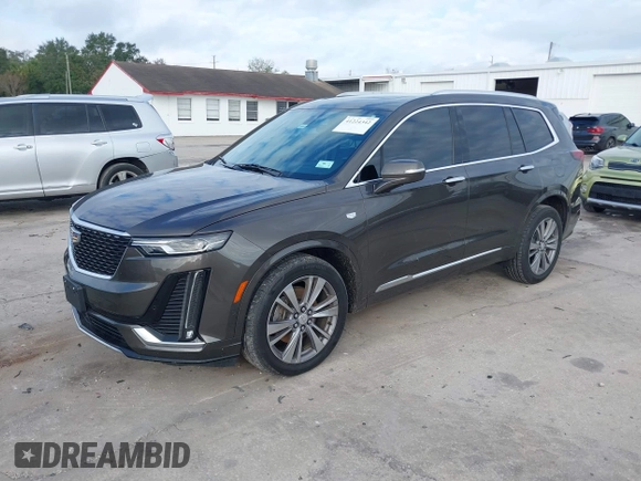 2020 Cadillac XT6 AWD Premium Luxury with VIN 1GYKPDRS2LZ205541, listed as a IAAI auction lot 41224342 with 53,947 mi miles and . Bid and sale history available at DreamBid. Image 2.