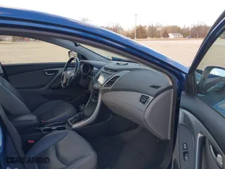 2014 Hyundai Elantra SE with VIN KMHDH4AE6EU130694, listed as a IAAI auction lot 41696190 with 121,588 mi miles. Bid and sale history available at carsss.com. Image 5.