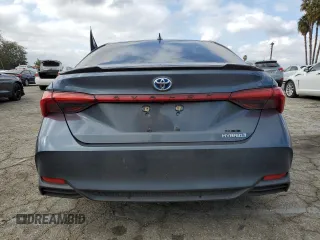 2019 Toyota Avalon Limited Hybrid z VIN 4T1B21FB3KU003922, wystawiony jako Copart lot #69477182 z przebiegiem 57 921 mil mil oraz . Historia ofert i sprzedaży dostępna na DreamBid. Obrazek 6.